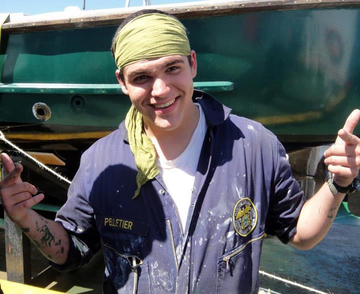 This is one of me in my work uniform. I think this was taken off the coast of Malta over the summer.